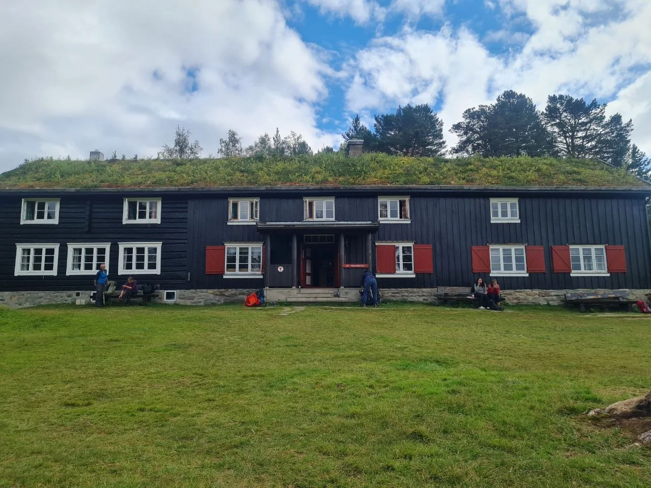 Hut with distinctive sod roof, resting spot on classic route