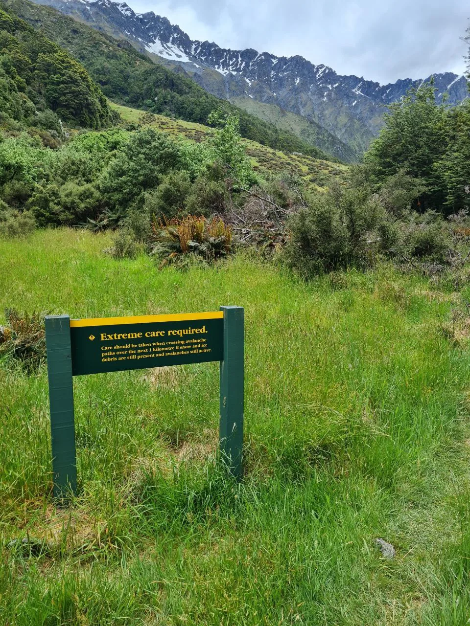 Avalanche hazard warning sign on the Rees-Dart Track, New Zealand.